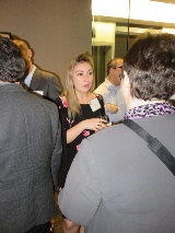 People mingling at poker tournament