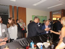 People mingling at poker tournament