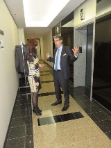 People talking outside elevator