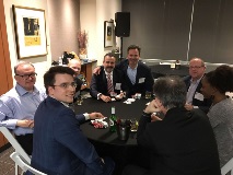 Group of people at poker table