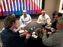 Group of people at poker table