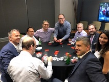 Group of people at poker table