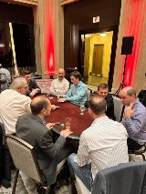 Group of people at poker table