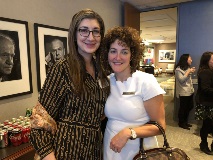 Two women smiling at camera