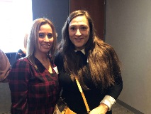 Two women smiling at camera