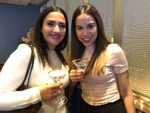 two women smiling at camera