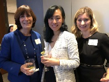 three women smiling at camera