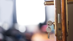 Key in the lock on an unopened door