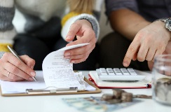 Accountant and client crunching numbers