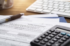 Documents and calculator on a table