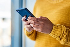 Person looking at cell phone