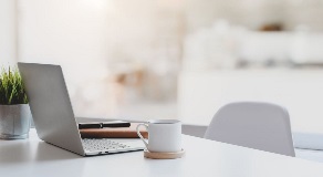 Laptop on white desk